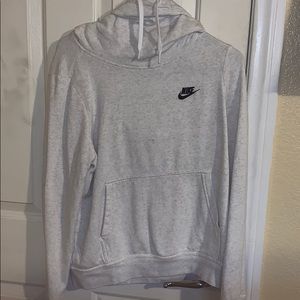 A white Nike hoodie